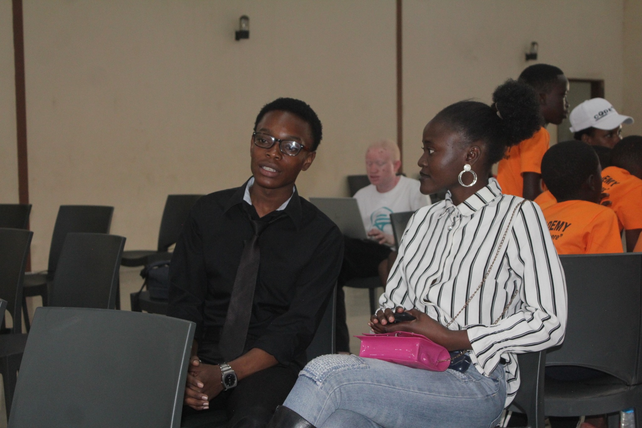 Students collaborating at a Code and Play Studios session